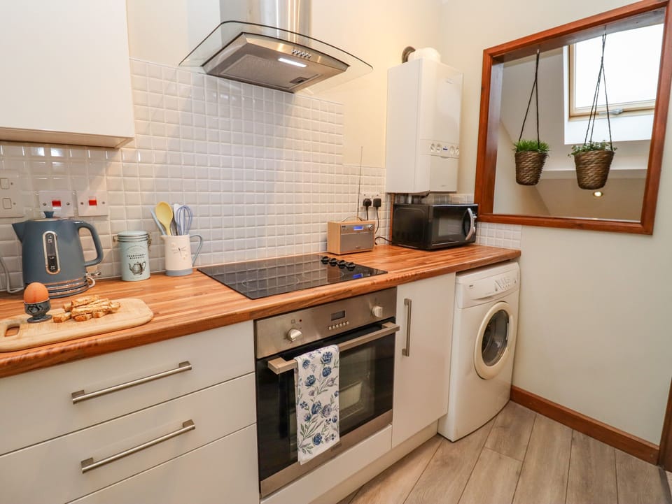 Fridge, electric kettle, toaster, cookware/dishes/utensils