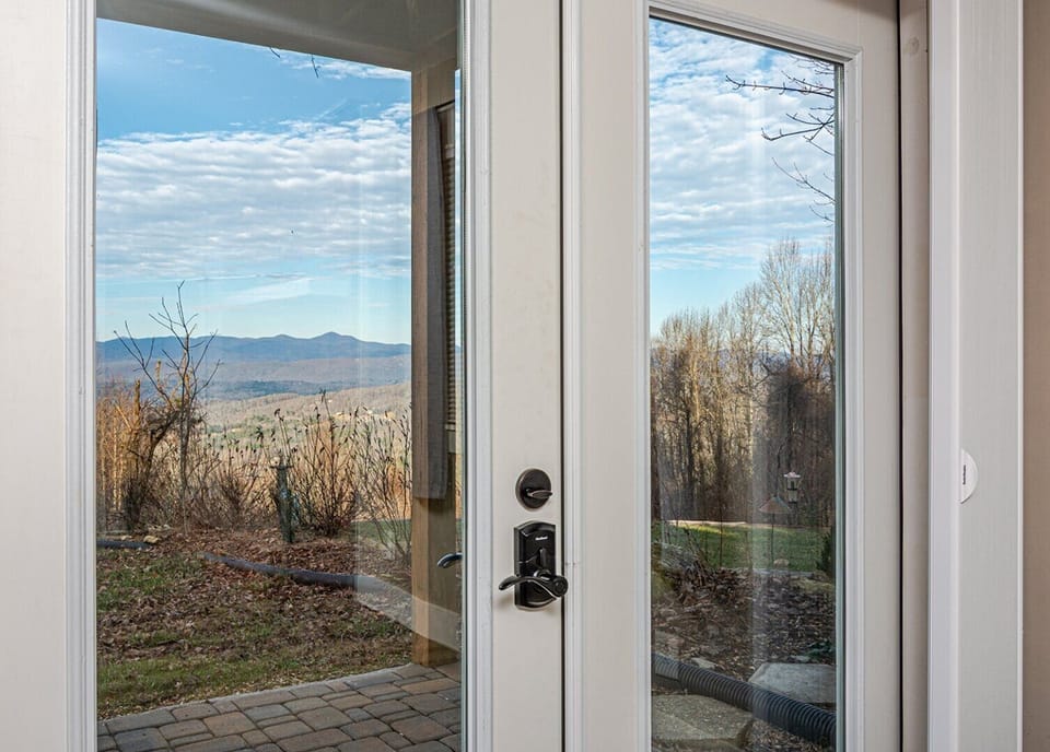 Double doors to oversized open air deck