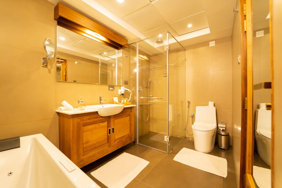 Superior Double Room | Bathroom | Separate tub and shower, rainfall showerhead, designer toiletries