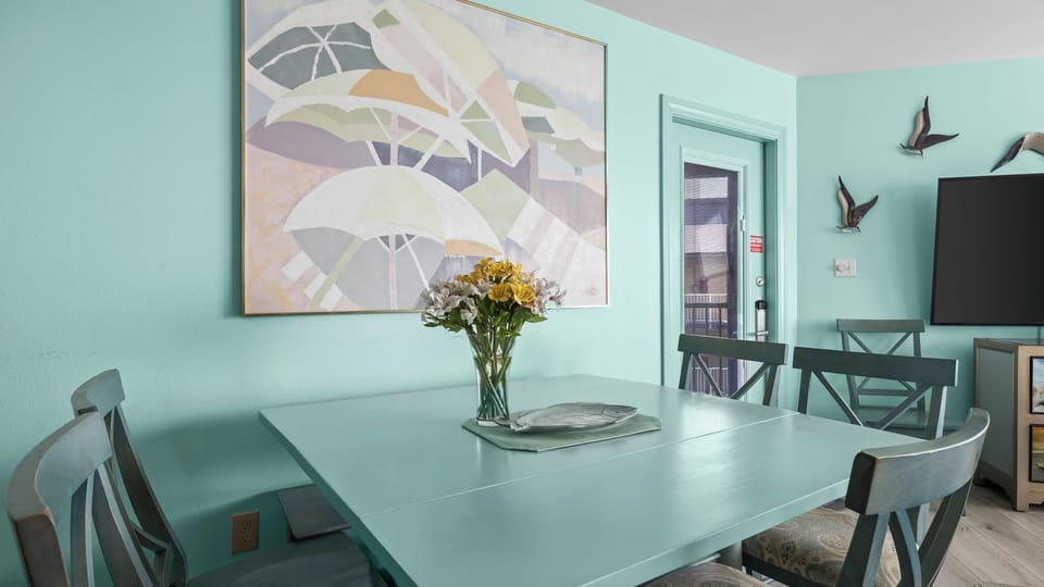 Sandpiper 16C - Dining area with seating for up to seven, ideal for enjoying meals together.