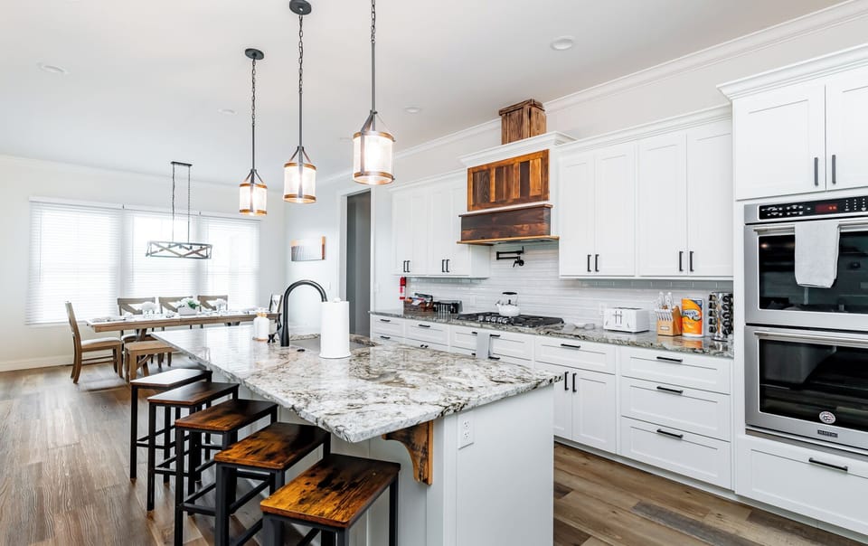 Whether you're cooking breakfast before a Bourbon Trail tour or hosting a family dinner, this spacious chef's kitchen has everything you need—including a large island with seating for everyone.