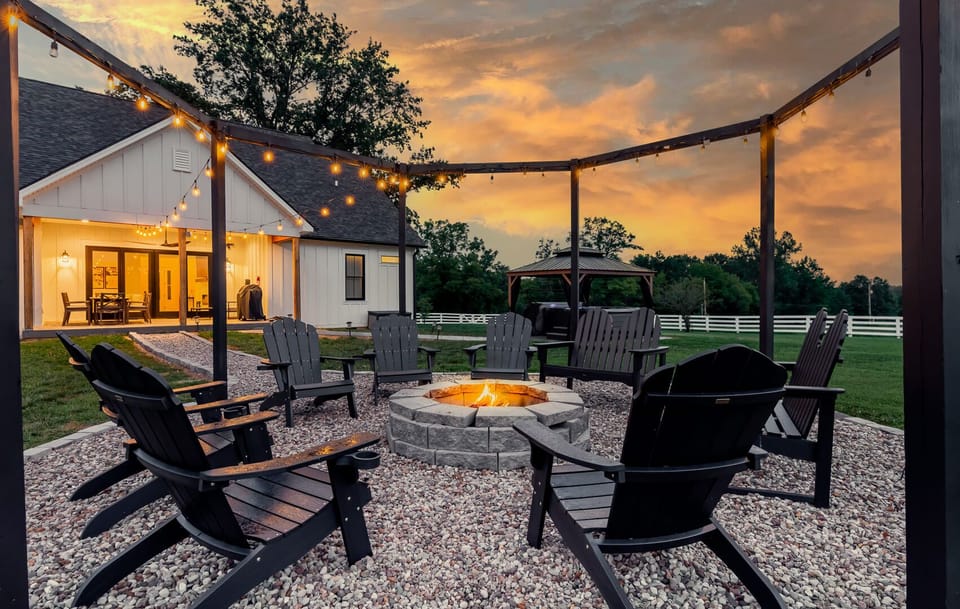 Gather around the fire pit in this cozy countryside retreat. With seating for 12, it’s the perfect spot to unwind, enjoy the night skies, and make memories under the stars.