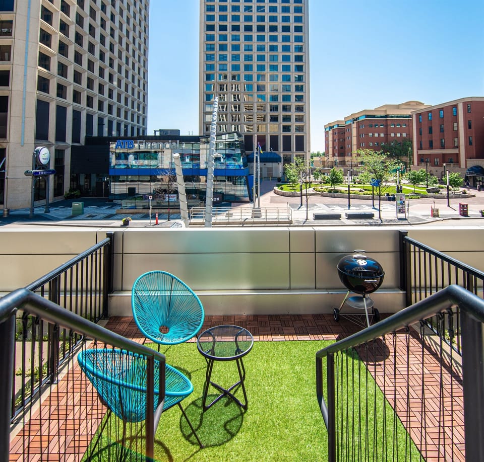 Enjoy downtown Edmonton views from the private balcony—ideal for your morning coffee or evening wine