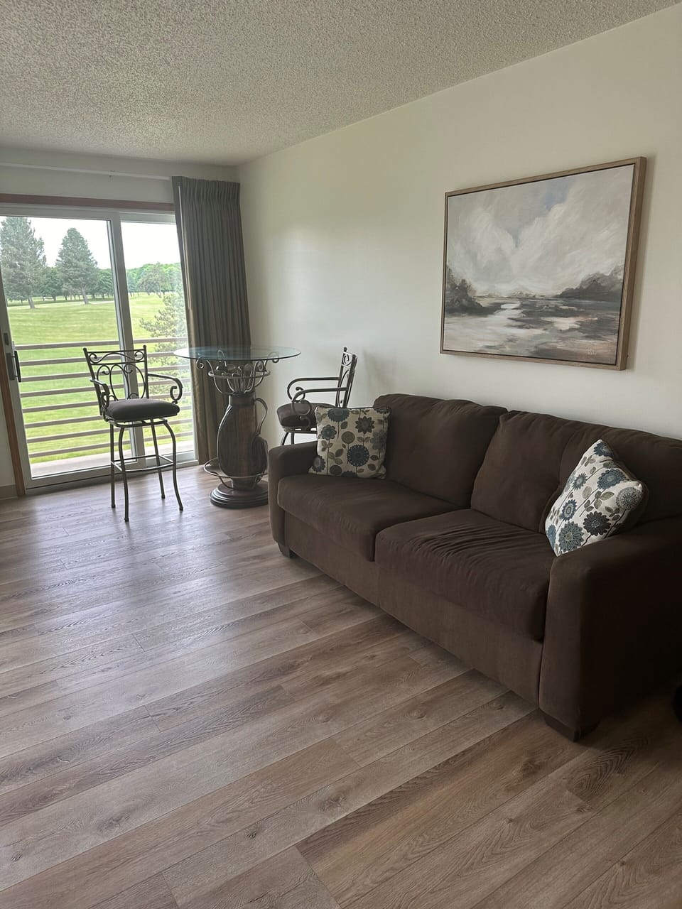 Luxury Studio Suite, 1 Bedroom, Golf View | Living area | 55-inch plasma TV with cable channels