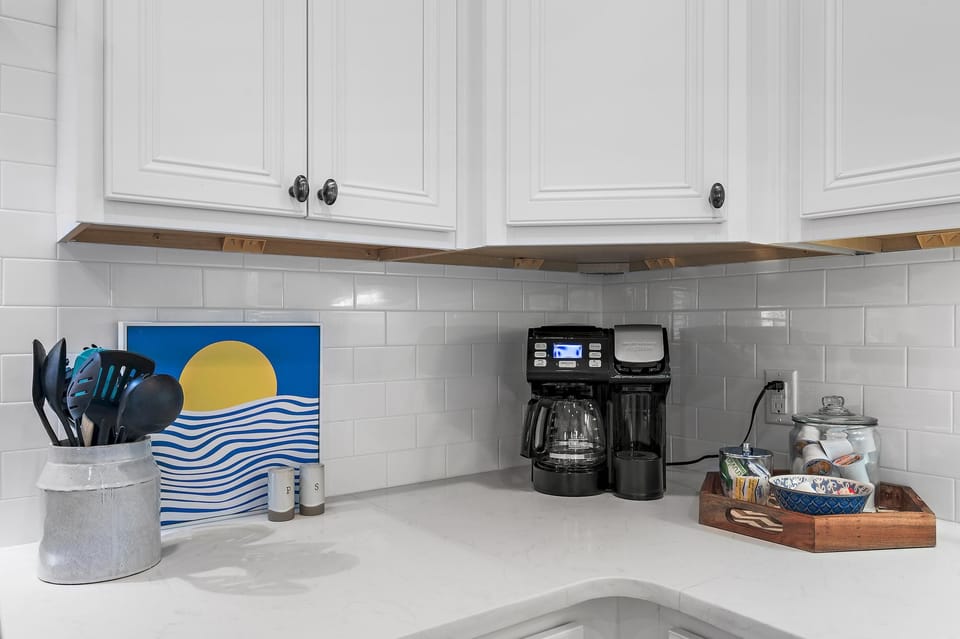 Bright, organized kitchen corner with modern coffee setup