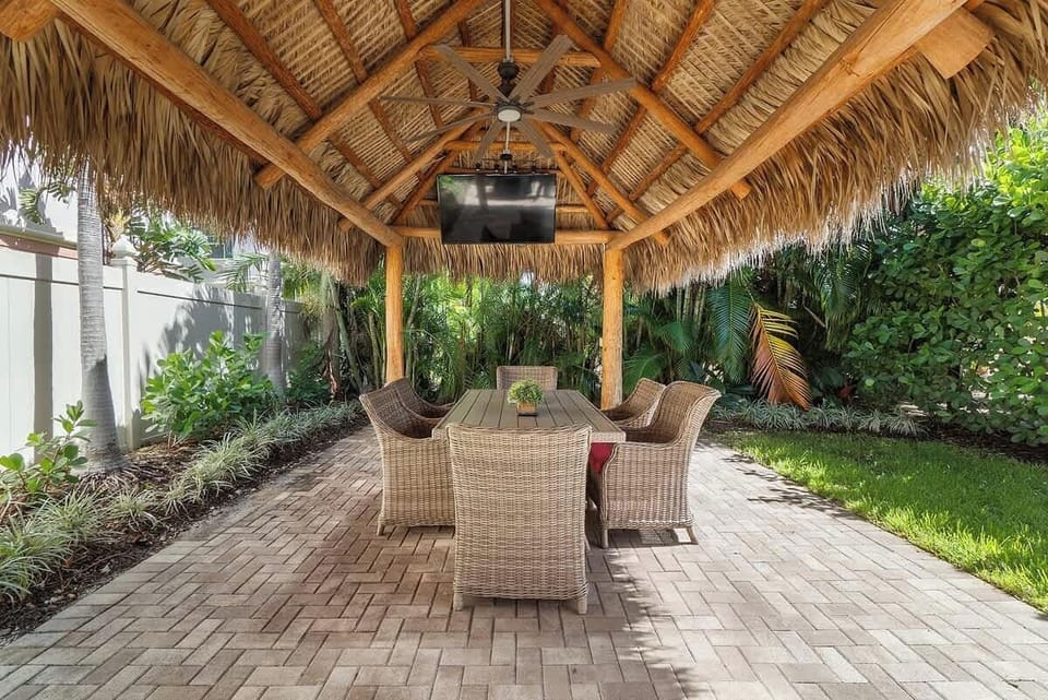 Relax under the shady Tiki Hut, fire up the grill and watch the big game on the outside TV with friends and family!