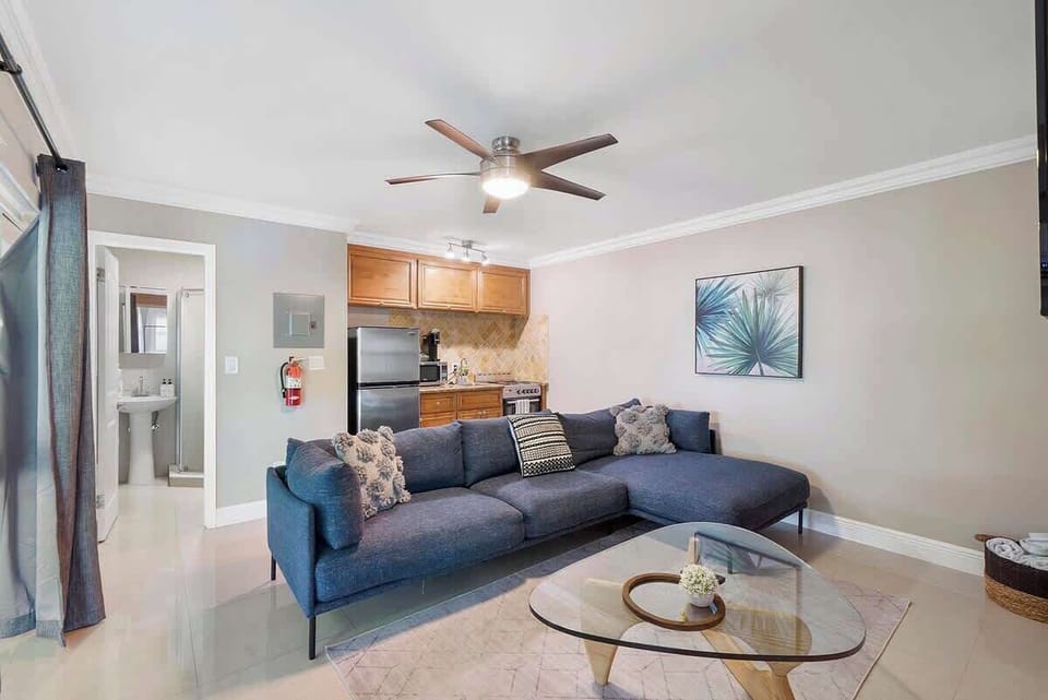 Living room in unit 3 (1 bedroom unit) includes a large comfortable couch a large screen HD TV with Netflix and Prime!