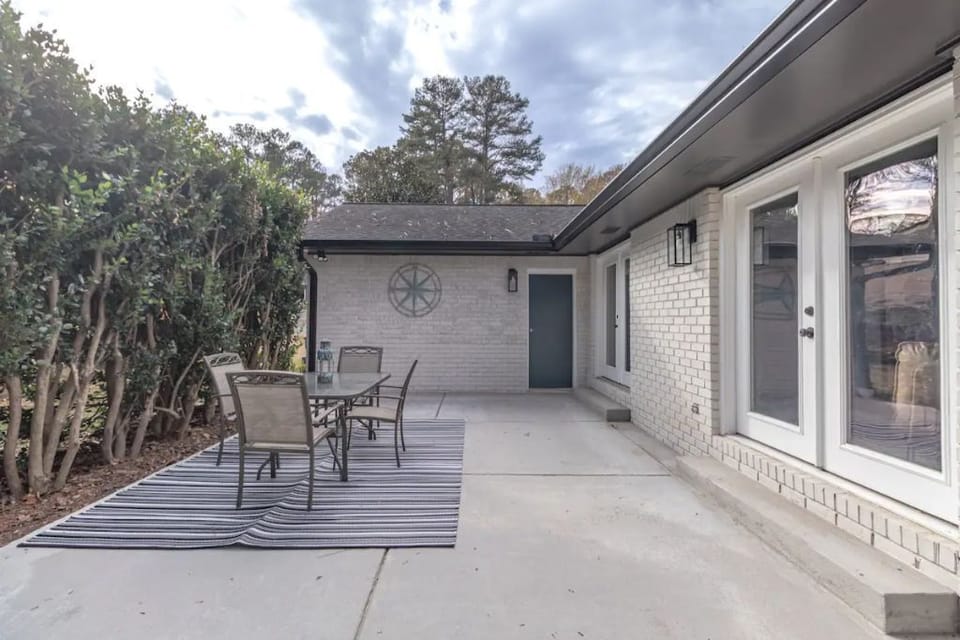 Back patio - grill and zero gravity chair available for use.