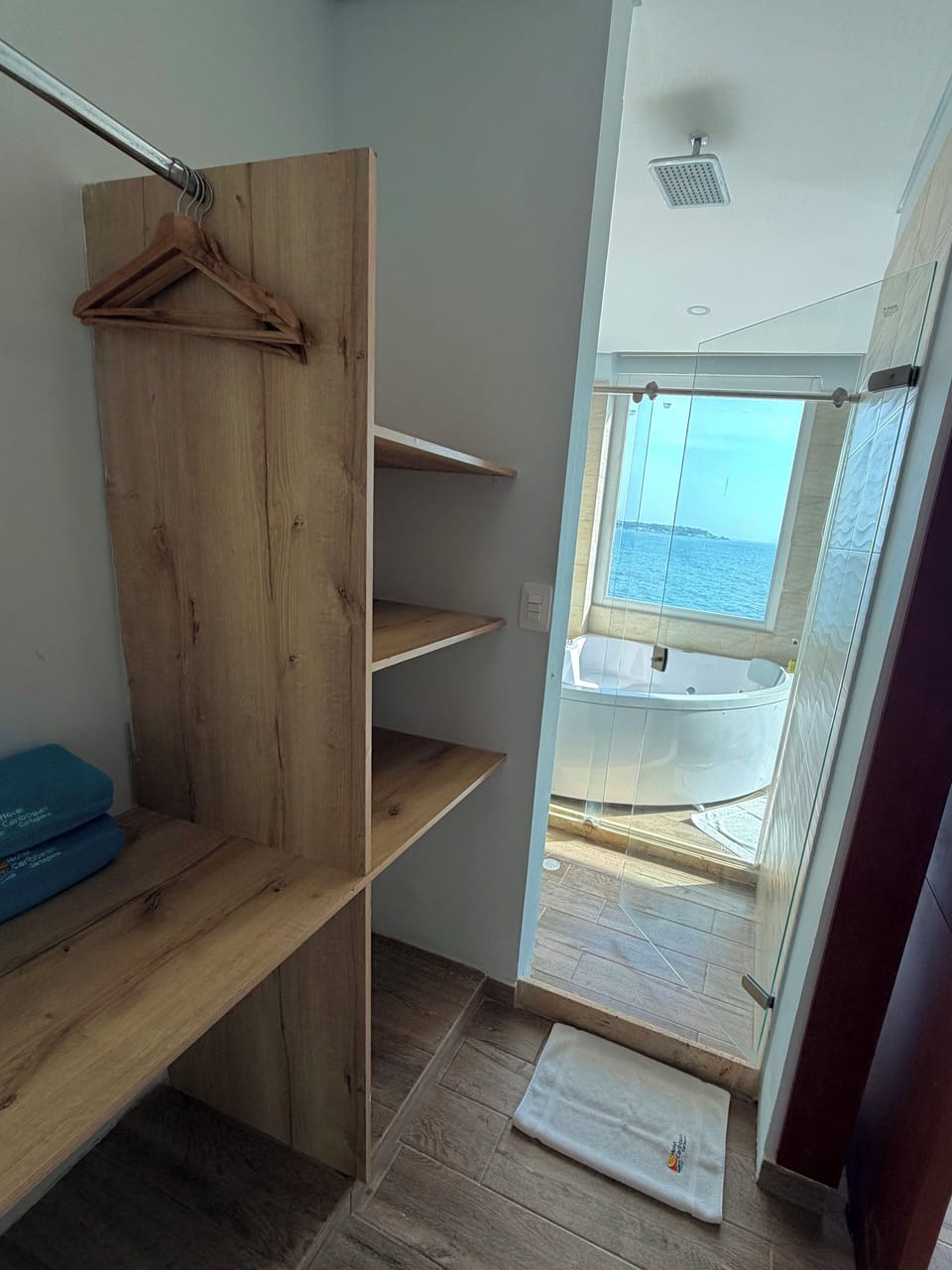 Superior Double or Twin Room, Hot Tub, Sea View | Bathroom | Shower, rainfall showerhead, towels, soap
