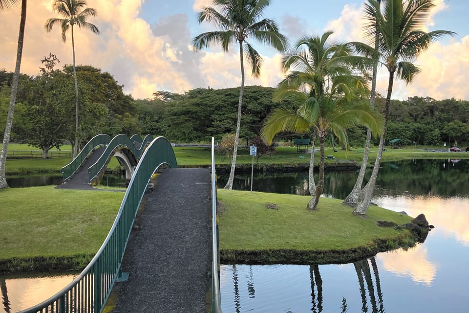 Stroll Wailoa Park’s walking path and its arched bridges