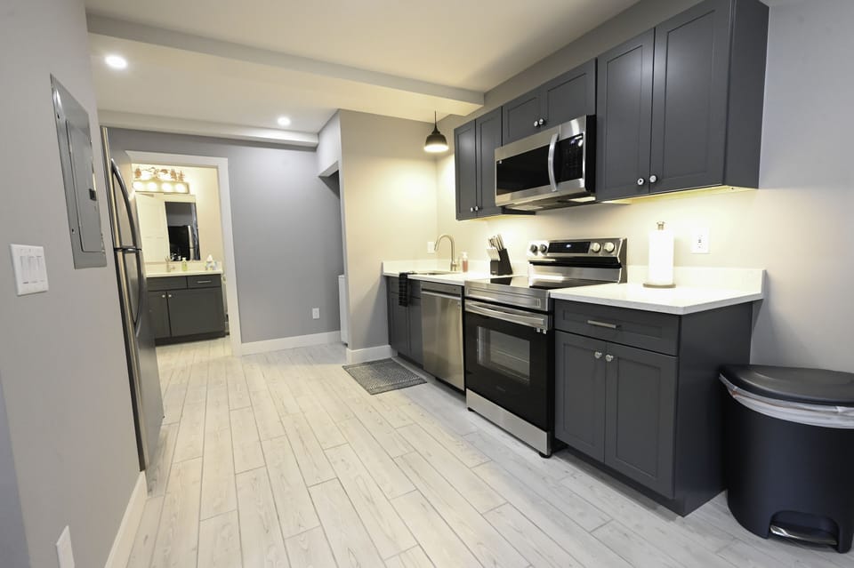 Full kitchen with Stove, oven, microwave, large refridgerator, Dishwasher. 