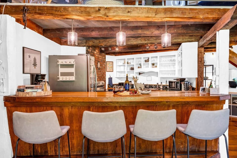 Begin your day in our adorable breakfast nook, where cozy furnishings and natural light create the perfect ambiance for a delightful morning meal.