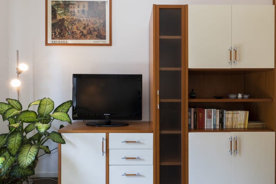 City Apartment | Living area | 42-inch flat-screen TV with digital channels, TV