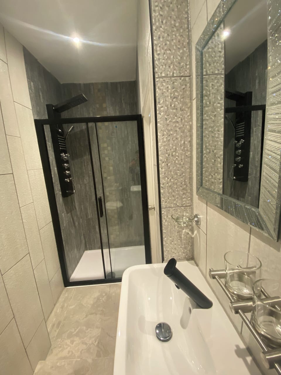 Deluxe Room, 2 Bedrooms | Bathroom | Shower, free toiletries, towels, soap