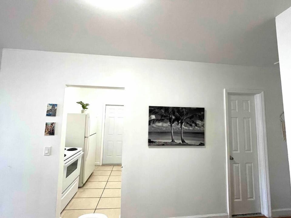Kitchen and bathroom entrance from the dinning room.