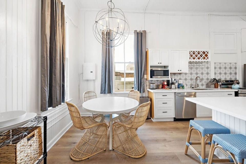 This dining area is located next to the kitchen