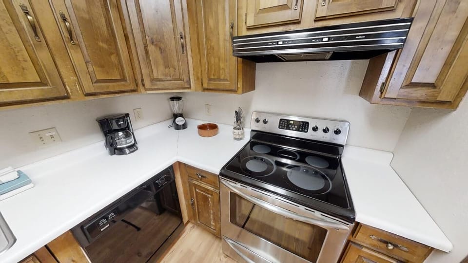 Your fully equipped kitchen awaits, complete with modern appliances and ample counter space to prepare your favorite meals during your stay.