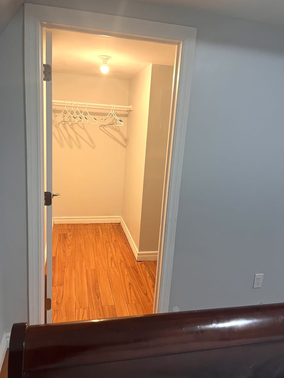 Large walk-in closet with hangers 