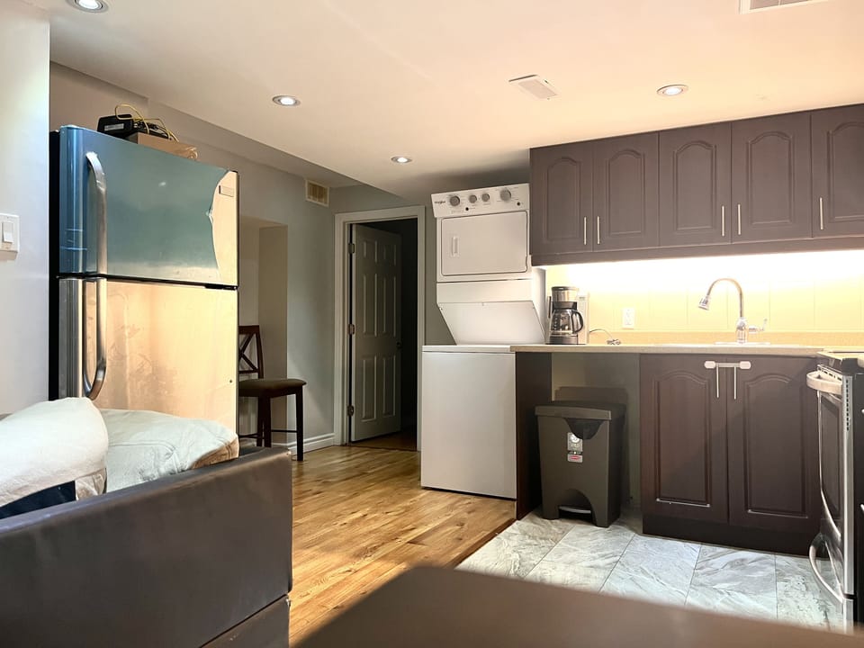Large kitchen with cooking utensils and basic kitchen essentials 