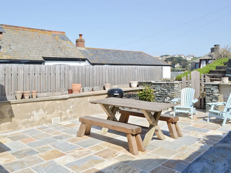 Sitting-out-area | Driftwood Cottages - The Stables by the Sea, Porth. nr. Newquay
