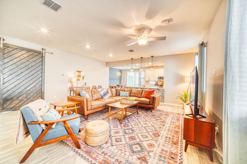 Spend time with loved ones in this comfy and colorful living room!