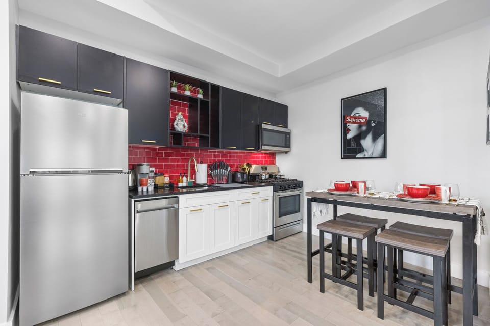 Intimate 4-seater dining area with a stylish table and comfortable chairs, perfect for sharing meals and creating cherished memories with loved ones.

