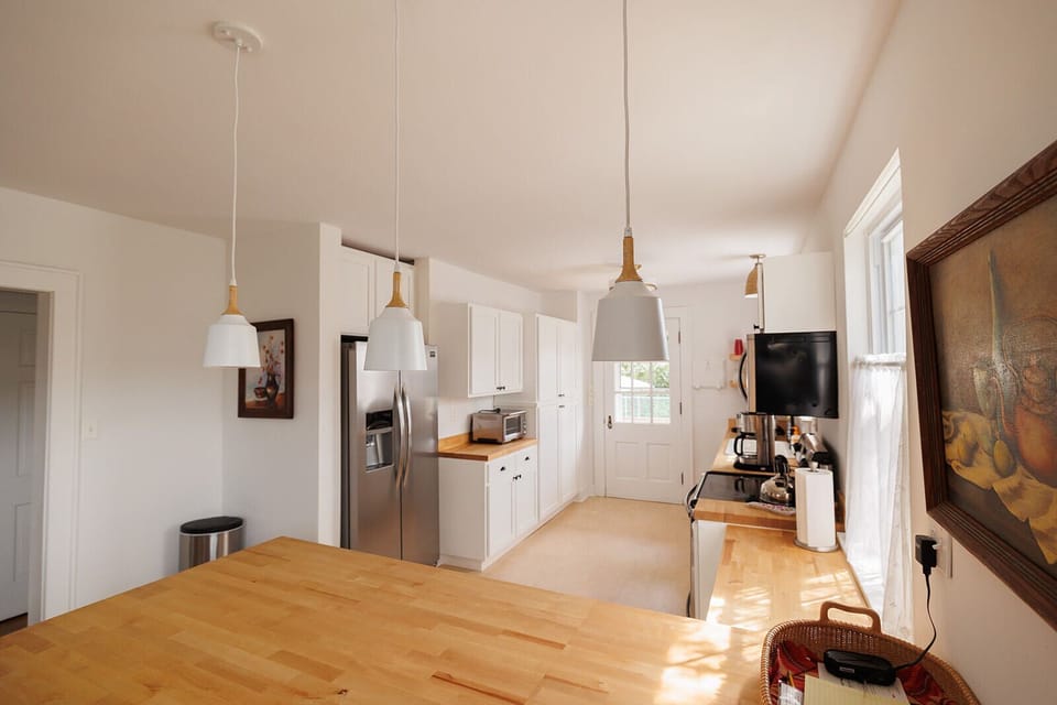 Beautiful kitchen easy to prep and cook in while still being part of happy hour! 