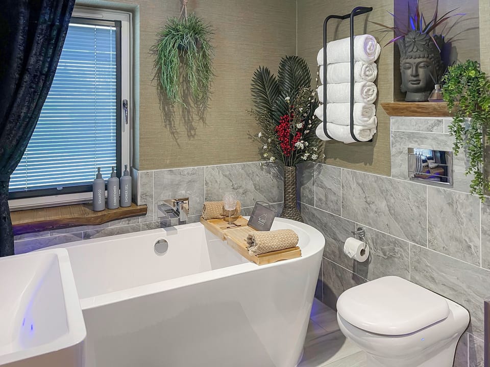 Luxury Bathtoom with Double ended bathtub and drencher shower | Cherry Cottage, Little Salkeld, near Penrith
