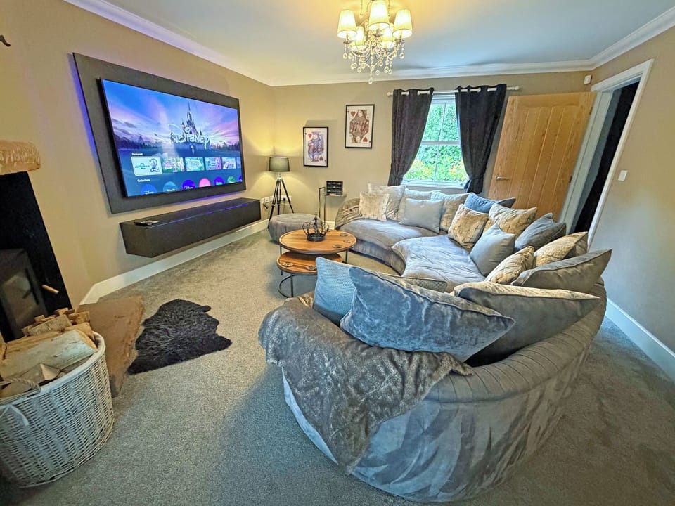 Cinema Room - Samsung 80" TV - Cinema sofa - perfect for movie nights | Cherry Cottage, Little Salkeld, near Penrith