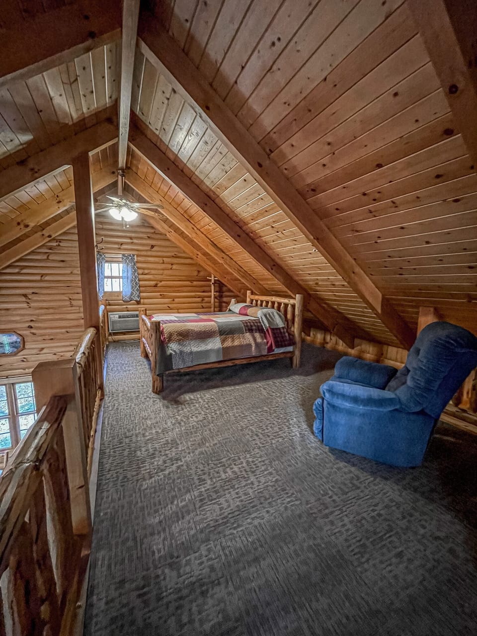 Loft bedroom with queen bed.