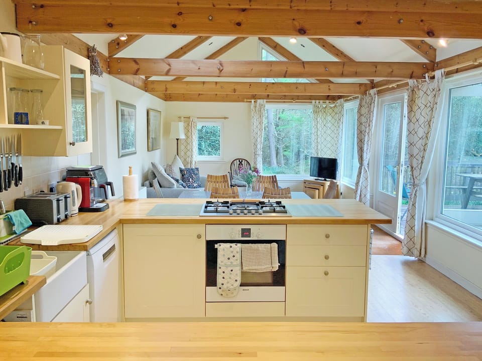 Looking through kitchen to dining and living areas beyond | Garrique Cottage, By Kippen, near Stirling