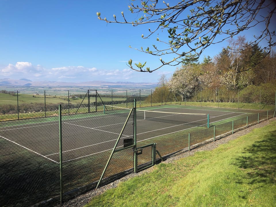 Tennis court, free for visitors to use | Garrique Cottage, By Kippen, near Stirling