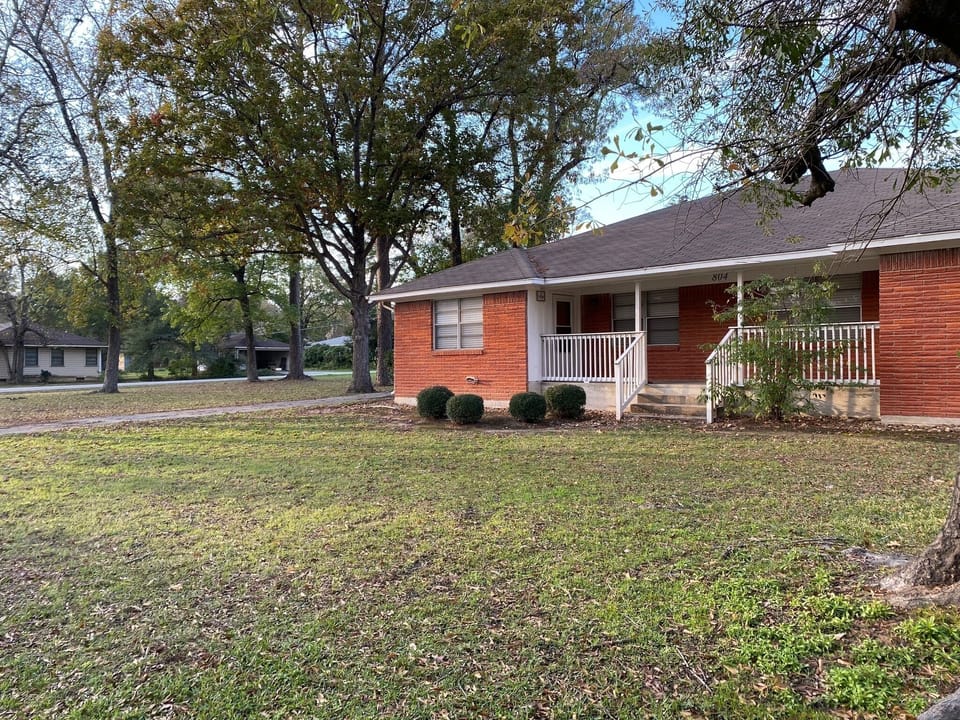 Front of the home and enjoy the vacant land space too. 