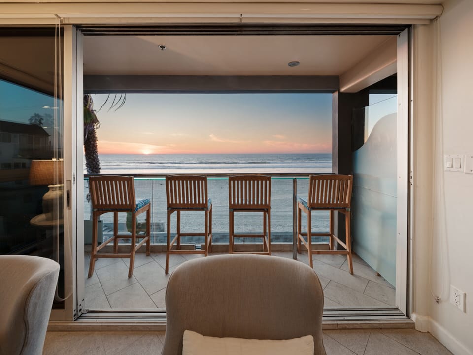 This living space offers easy access to outdoor areas, perfect for enjoying the views.