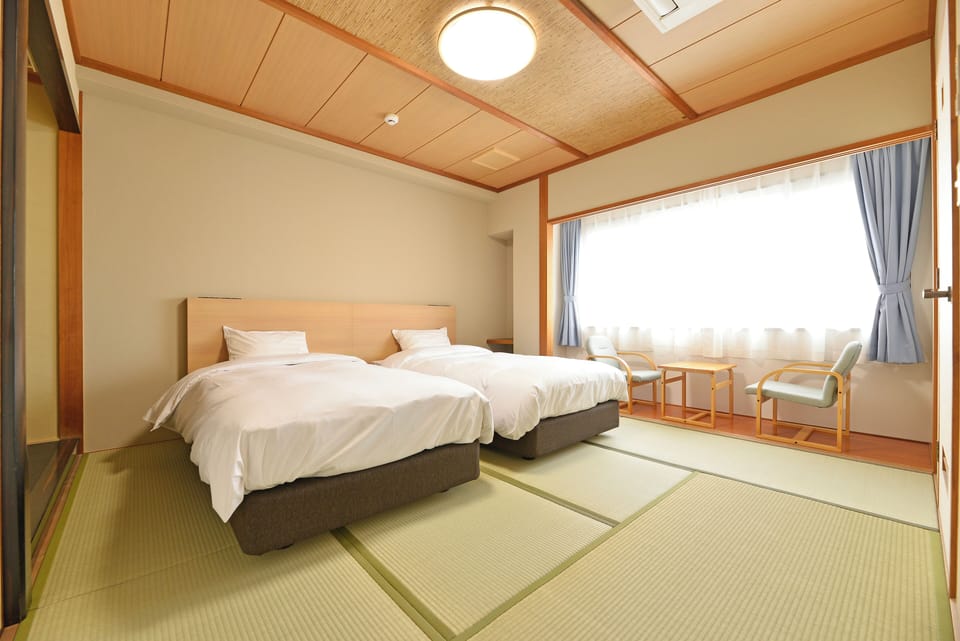 Standard Room A with Japanese-Western style (28 sqm) Non-Smoking | Free WiFi, bed sheets