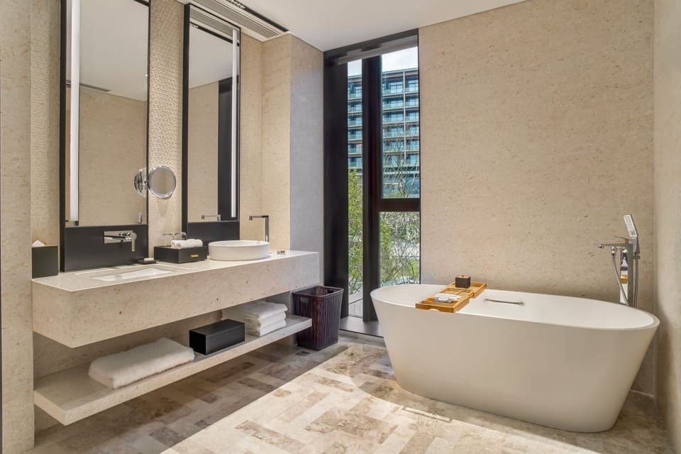 Deluxe Villa, 1 Double Bed | Bathroom | Separate tub and shower, hair dryer, bathrobes, slippers