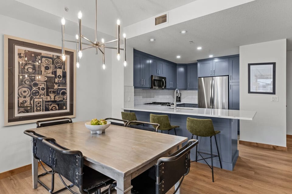 Beautifully designed dining area with fun artwork