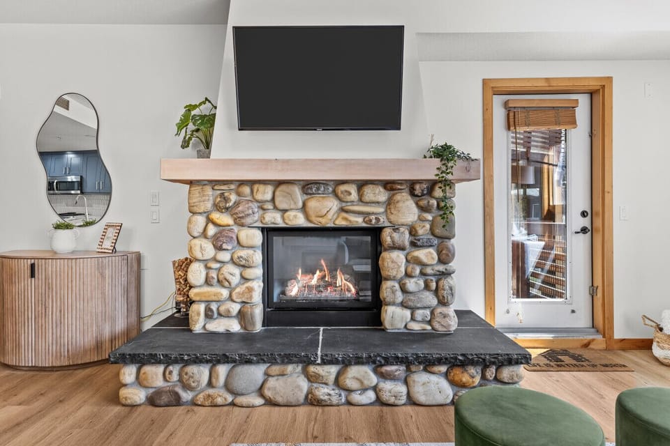 Giant feature fireplace with traditional stonework