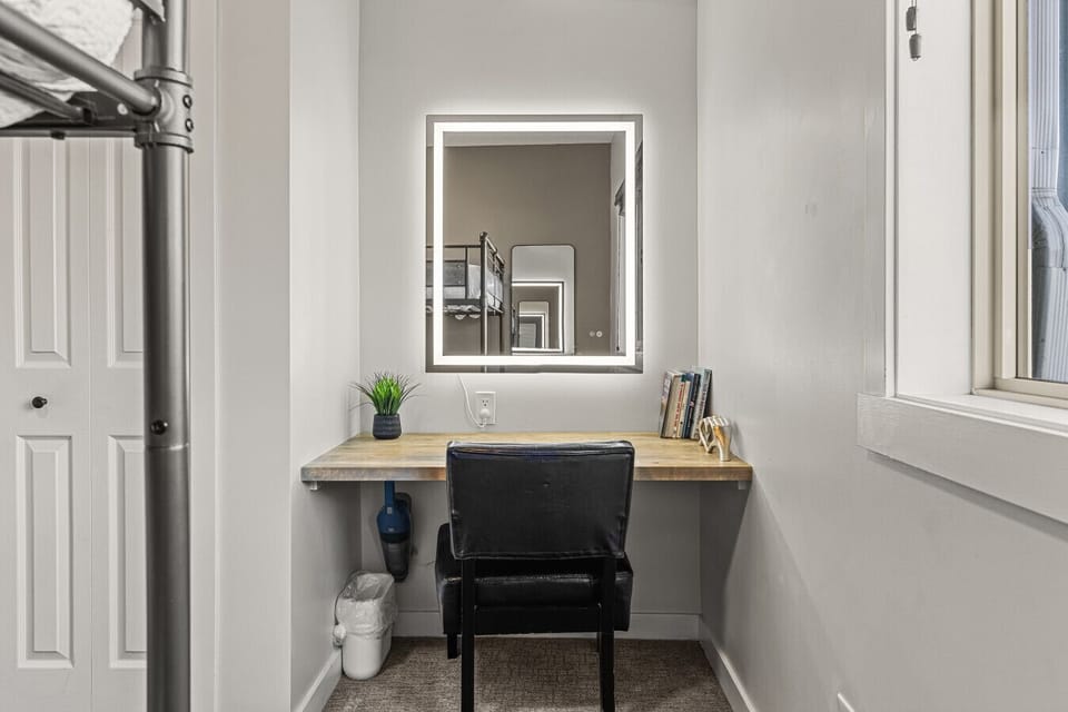 This space doubles as another workspace or a dressing table - perfect for getting ready for events or night`s out!