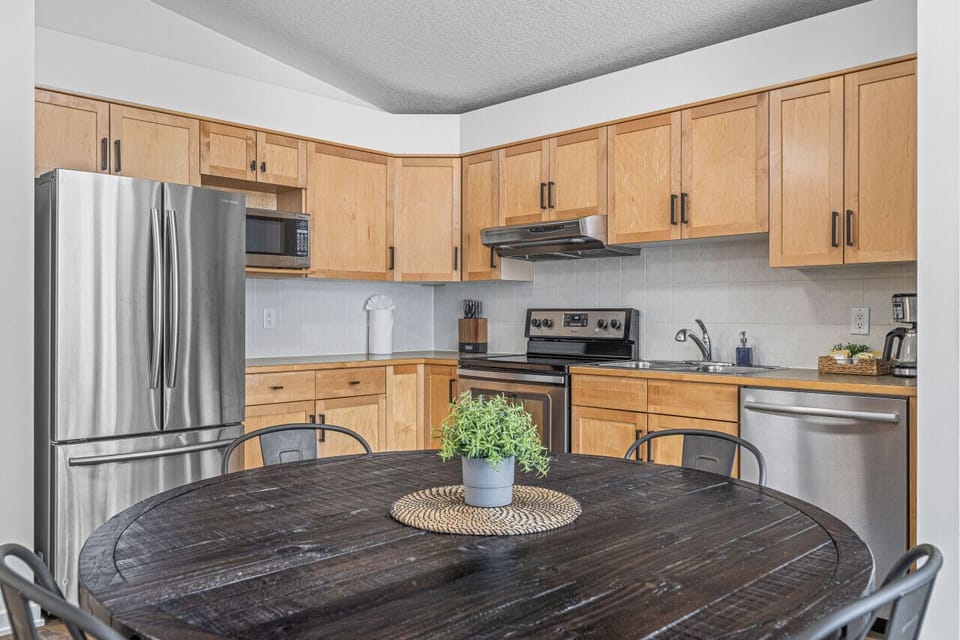 Plenty of room for 4 people to gather round the dining table to eat or play board games - which are provided)