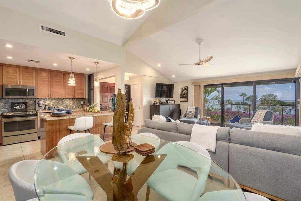 Dining area with blue ocean views in the distance