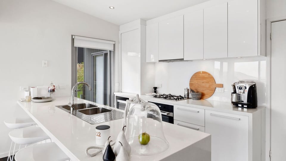  An upscale kitchen is all set to make preparing meals simple and stress-free. 
