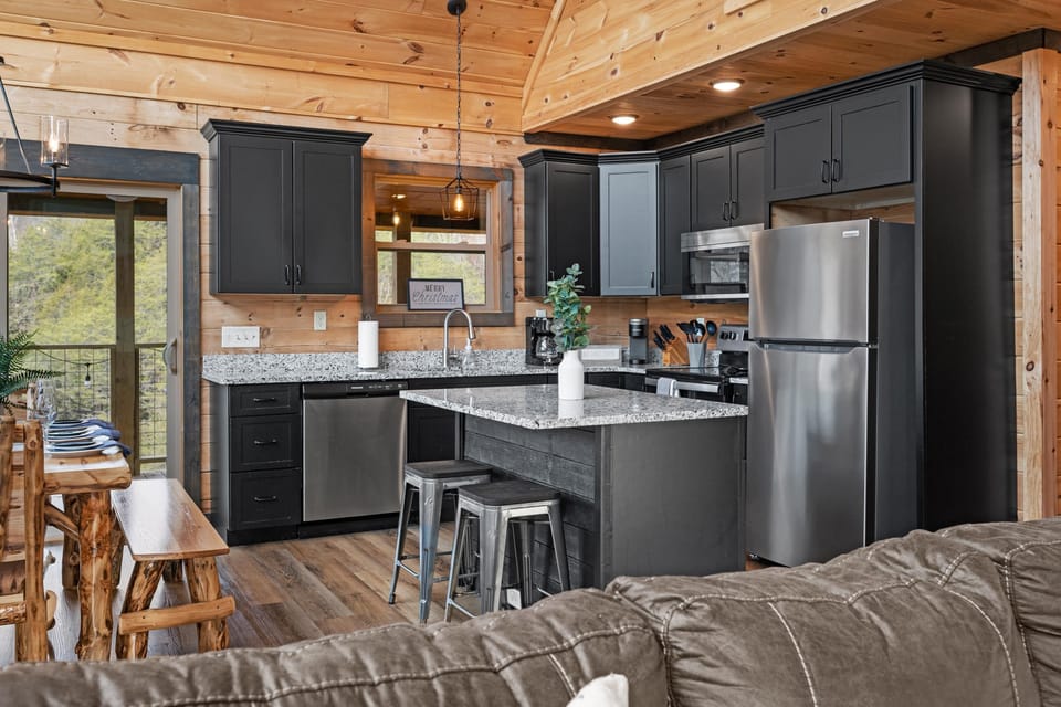 This spacious kitchen is the perfect area to create home cooked meals.