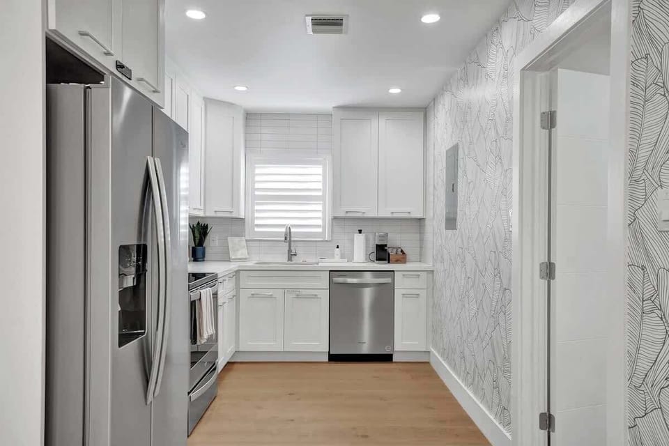 Kitchen in 2 bedroom/2 bath.  Both kitchens are fully stocked with everything you need to make and enjoy a gourmet meal.