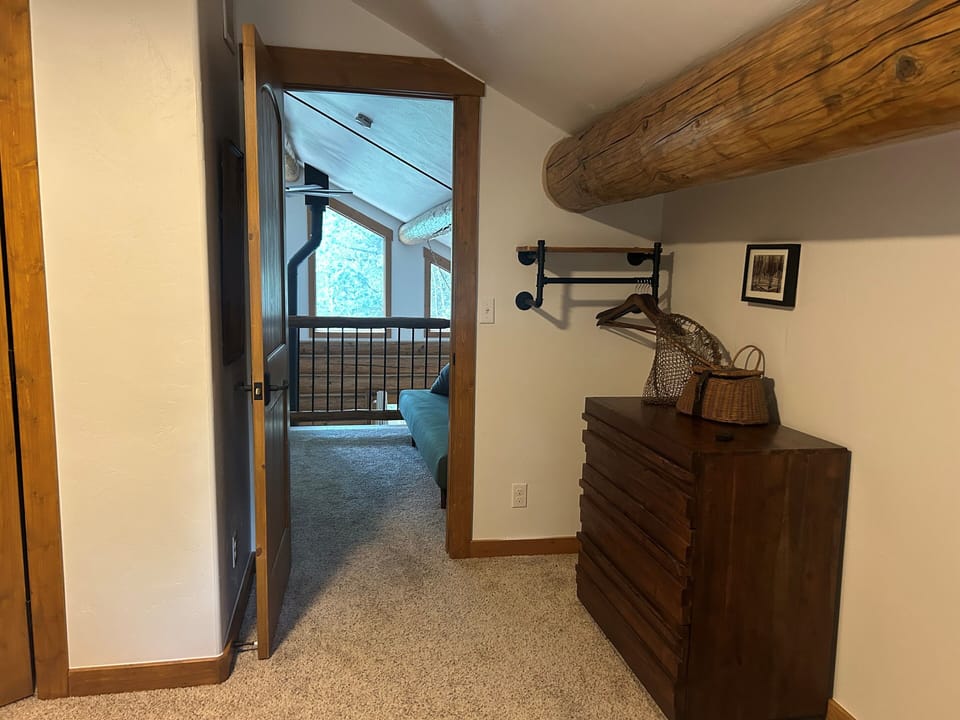 View from master bedroom out to landing/office area.