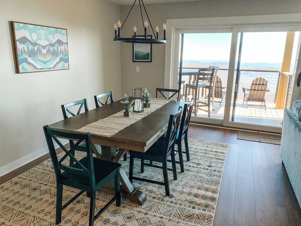 The dining table can comfortably seat 6 guests.