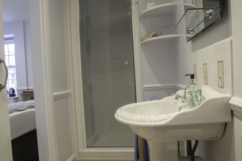 Double Room (Room 2) | Bathroom | Shower, rainfall showerhead, free toiletries, hair dryer