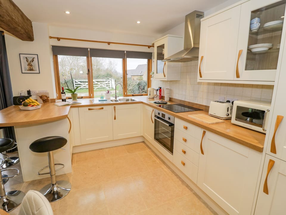 Cottage | Private kitchen | Fridge, dishwasher, electric kettle, toaster