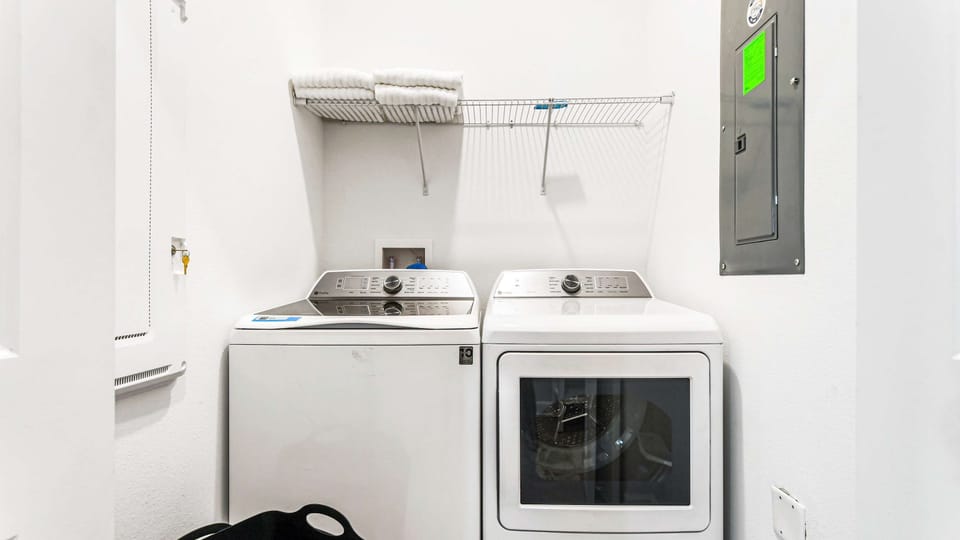 Laundry and dryer zone, facilitating efficient and organized clothes care for household convenience