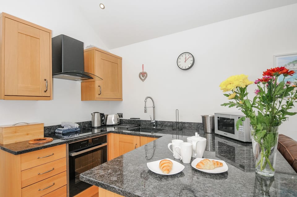 Fridge, electric kettle, toaster, cookware/dishes/utensils